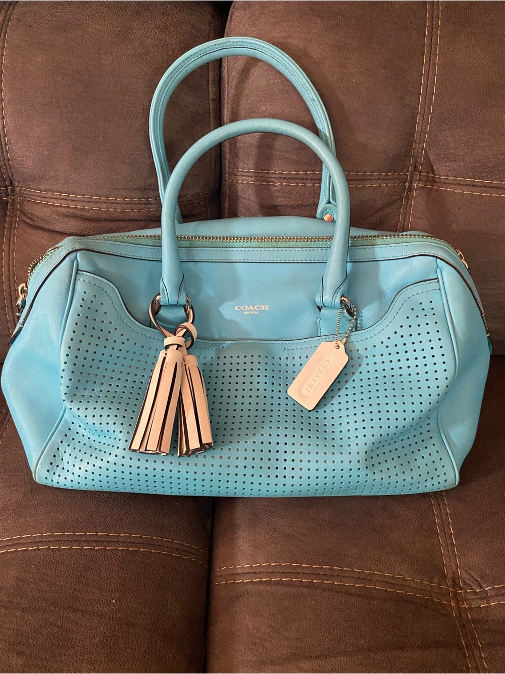 COACH Light Blue Perforated Leather Satchel with Tassel Charm